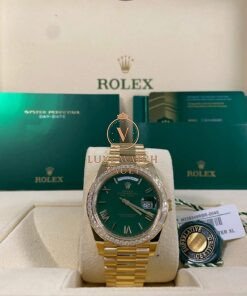 Rolex Yellow Gold Day-Date 40 Diamond-set Bezel Green Roman Dial